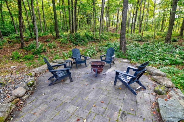 view of patio featuring a fire pit