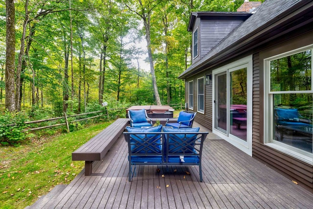 wooden deck with an outdoor hangout area