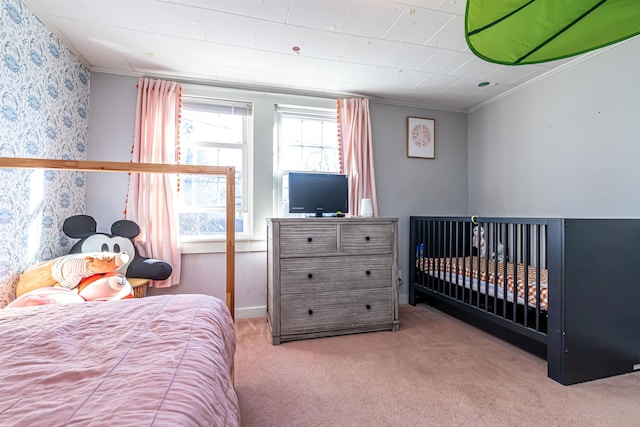 carpeted bedroom with crown molding