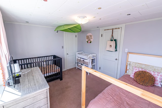 carpeted bedroom featuring ornamental molding