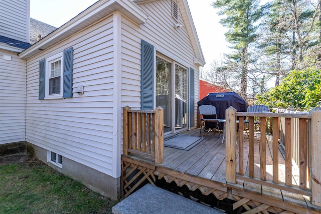 deck featuring a grill