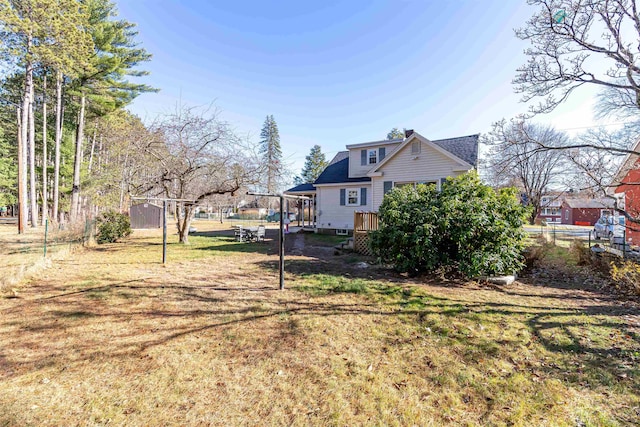 view of yard featuring a wooden deck