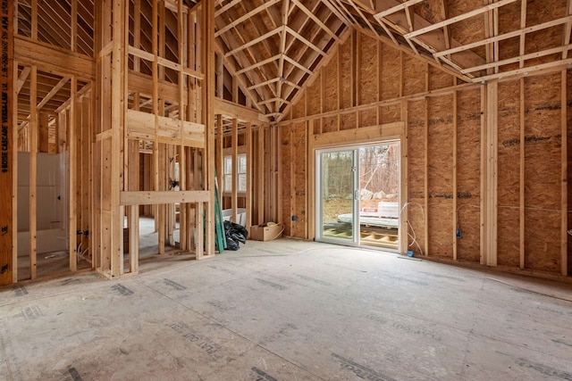 miscellaneous room featuring high vaulted ceiling