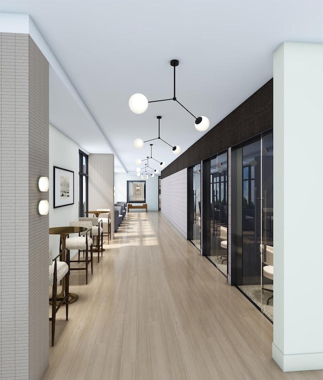 hallway featuring light hardwood / wood-style flooring