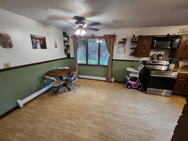 dining room featuring light hardwood / wood-style flooring, ceiling fan, and baseboard heating