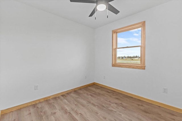 unfurnished room with ceiling fan and light hardwood / wood-style floors