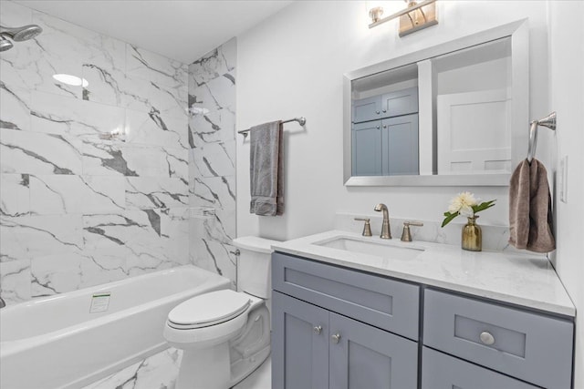 full bathroom featuring vanity, toilet, and tiled shower / bath combo