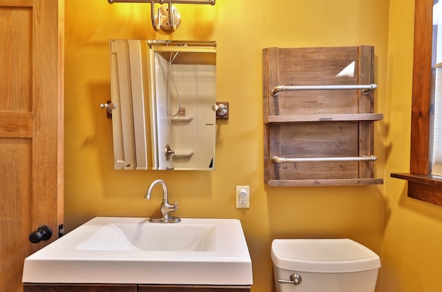 bathroom with toilet and sink