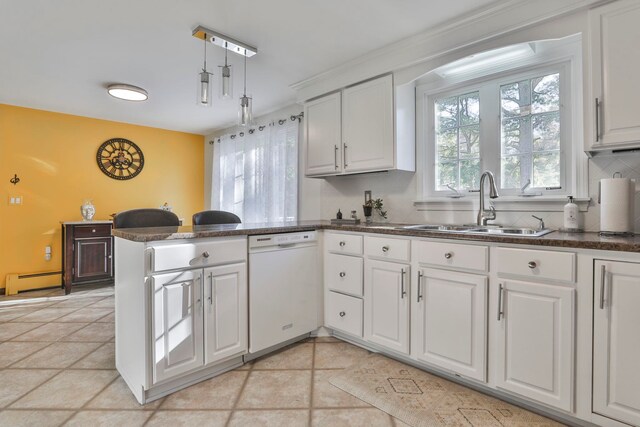 kitchen featuring dishwasher, kitchen peninsula, and white cabinetry