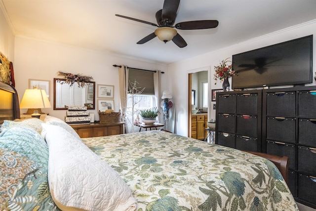 bedroom with ensuite bathroom, ceiling fan, and crown molding