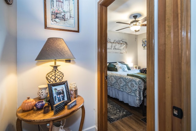 bedroom featuring wood-type flooring and ceiling fan