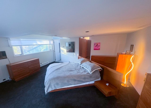 carpeted bedroom with a baseboard radiator