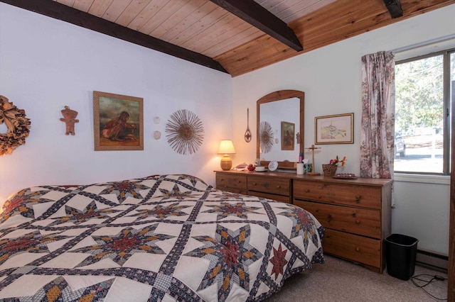 carpeted bedroom featuring vaulted ceiling with beams, baseboard heating, and wooden ceiling