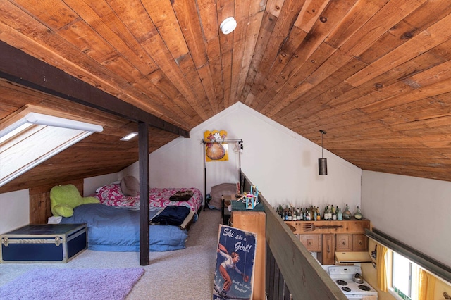 unfurnished bedroom with carpet flooring, washer / clothes dryer, wood ceiling, and vaulted ceiling