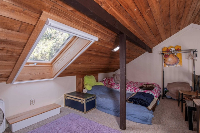 carpeted bedroom with vaulted ceiling with skylight and wood ceiling