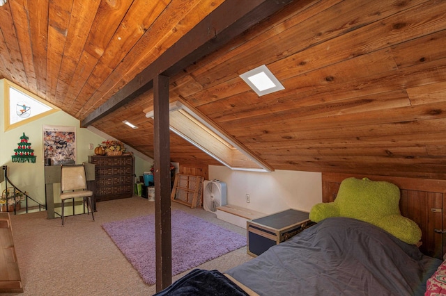 bedroom featuring carpet, lofted ceiling with beams, and wooden ceiling