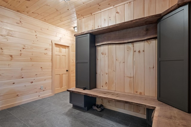 4 Hay Hill Rd, Lincoln, NH 03251 - mudroom featuring wooden walls, wood ceiling, and dark tile patterned flooring