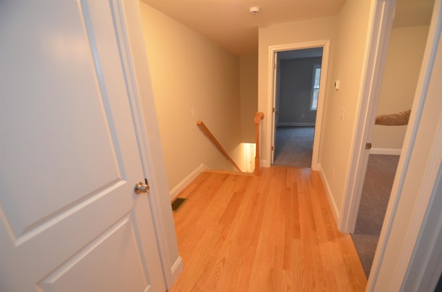 hallway featuring light hardwood / wood-style floors