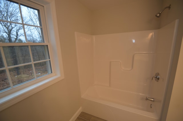 bathroom featuring shower / tub combination