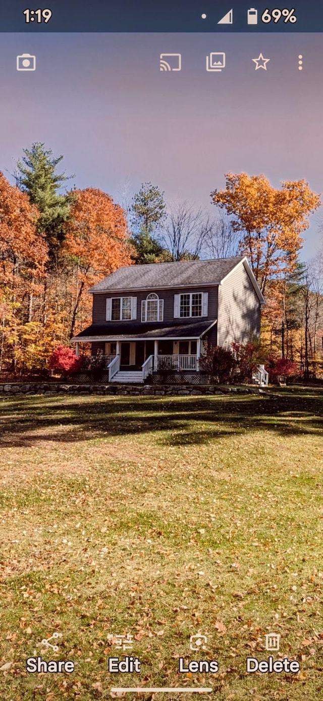 view of property with a lawn