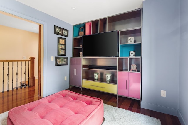 living room with dark hardwood / wood-style floors