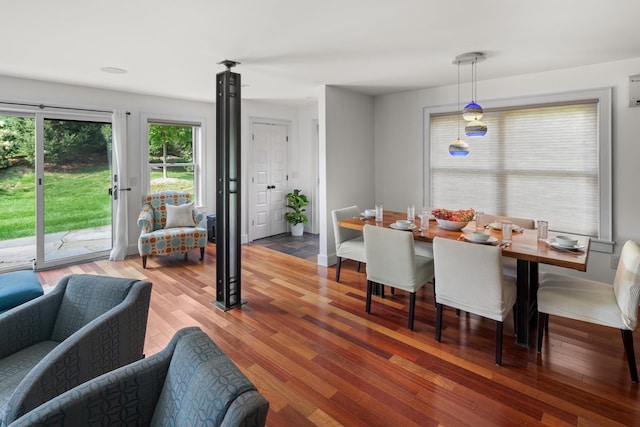 dining area featuring hardwood / wood-style flooring