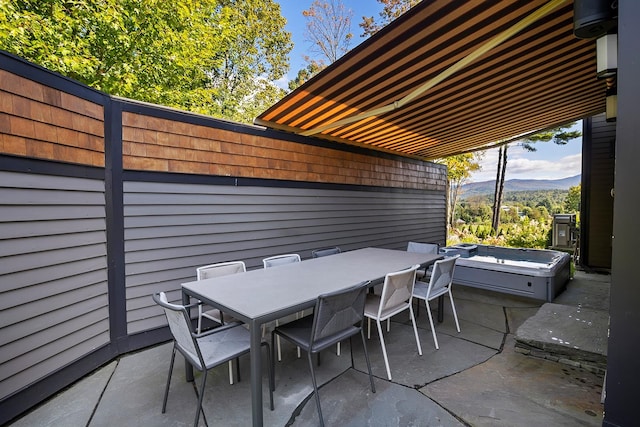 view of patio with a mountain view