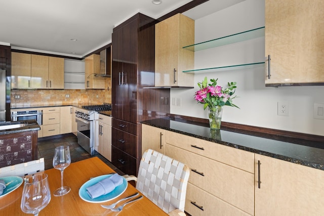 kitchen featuring light brown cabinets, backsplash, wall chimney exhaust hood, dark hardwood / wood-style flooring, and stainless steel appliances