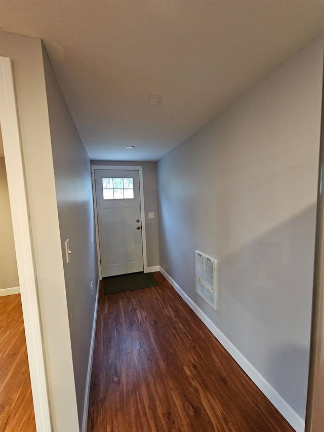 doorway to outside with hardwood / wood-style floors