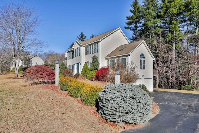 view of home's exterior with a garage