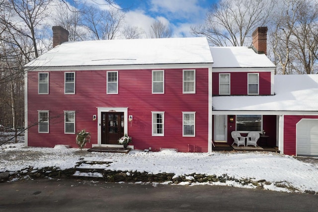 colonial-style house with a garage