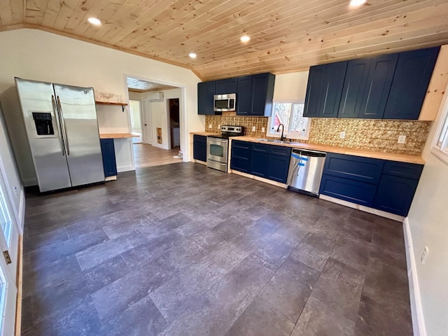 kitchen with blue cabinetry, sink, stainless steel appliances, lofted ceiling, and wood ceiling