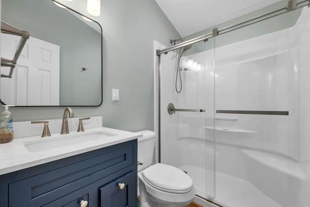 69 Grandview Dr, Woodstock, NH 03293 - bathroom with toilet, an enclosed shower, lofted ceiling, and vanity