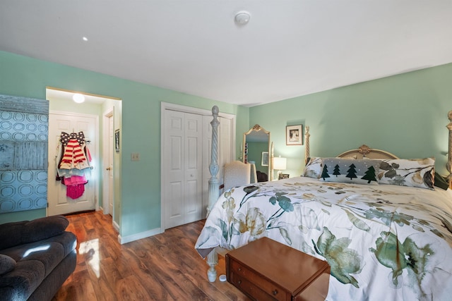 bedroom with dark wood-type flooring