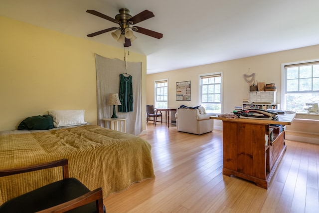 bedroom featuring ceiling fan and light hardwood / wood-style flooring