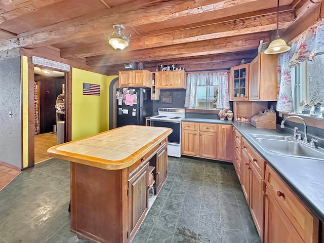 kitchen featuring black fridge, white electric range, sink, beamed ceiling, and decorative light fixtures