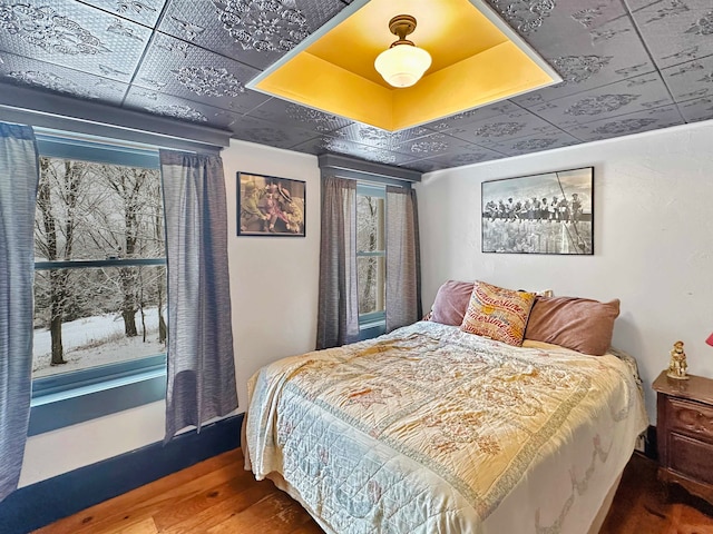 bedroom featuring hardwood / wood-style flooring