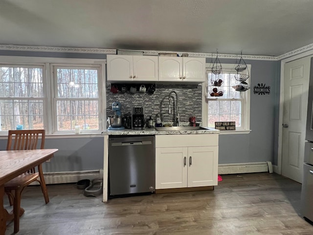 kitchen with stainless steel dishwasher, white cabinetry, baseboard heating, and dark wood-type flooring