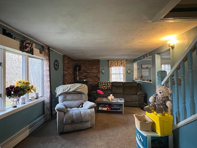 living room featuring carpet floors, a wood stove, and baseboard heating