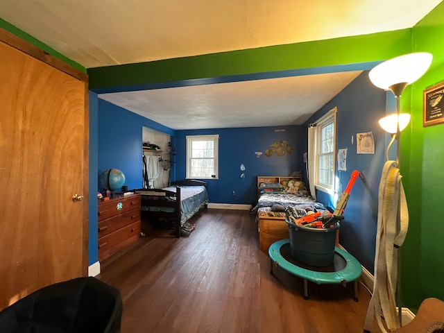 bedroom featuring dark hardwood / wood-style floors