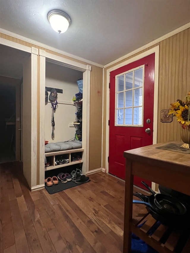 interior space featuring dark wood-type flooring and a textured ceiling