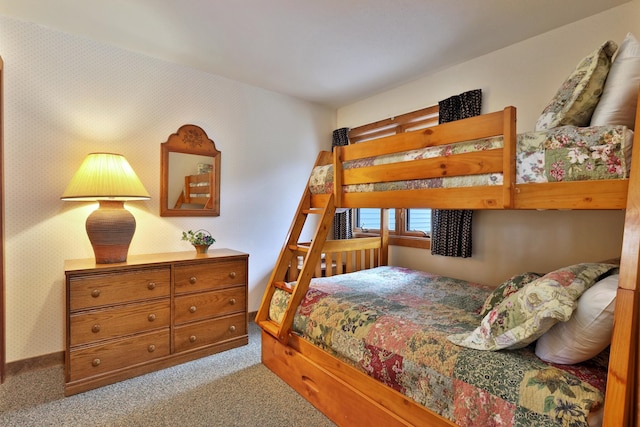 bedroom with light colored carpet