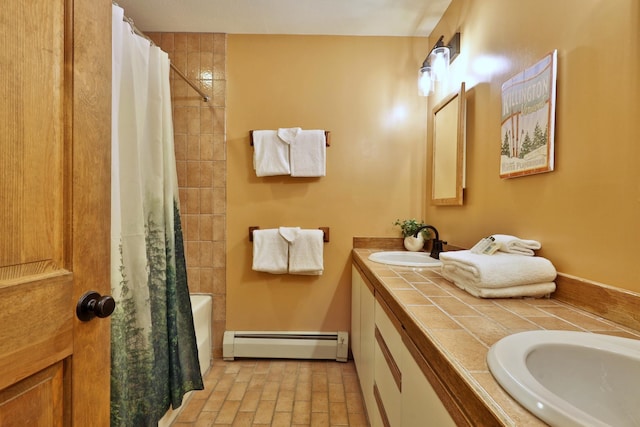 bathroom with shower / tub combo with curtain, vanity, and a baseboard radiator