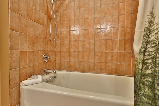 bathroom featuring shower / bath combination with curtain