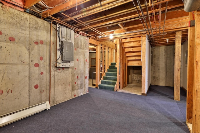 basement featuring electric panel and a baseboard radiator