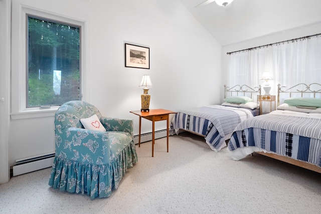 bedroom featuring ceiling fan, lofted ceiling, and a baseboard heating unit