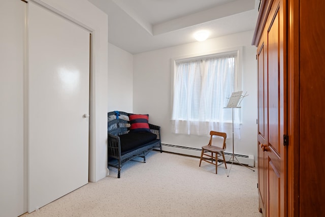 living area with baseboard heating