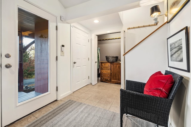 entryway featuring light tile patterned floors