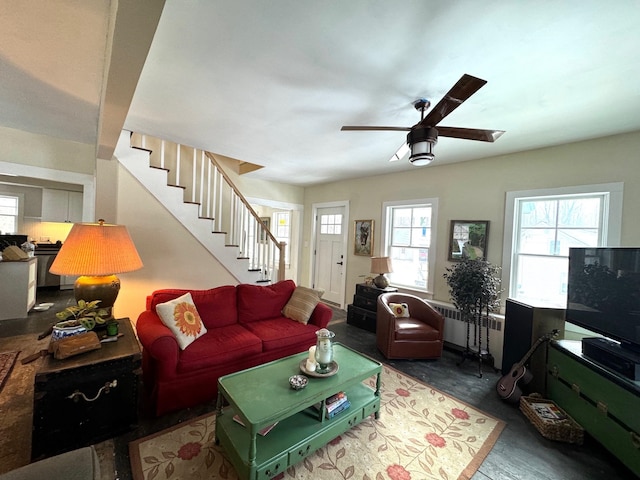 living room featuring ceiling fan