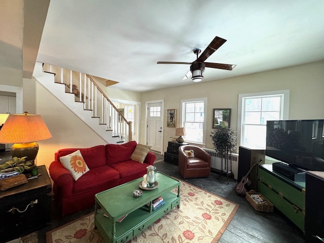 living room featuring ceiling fan